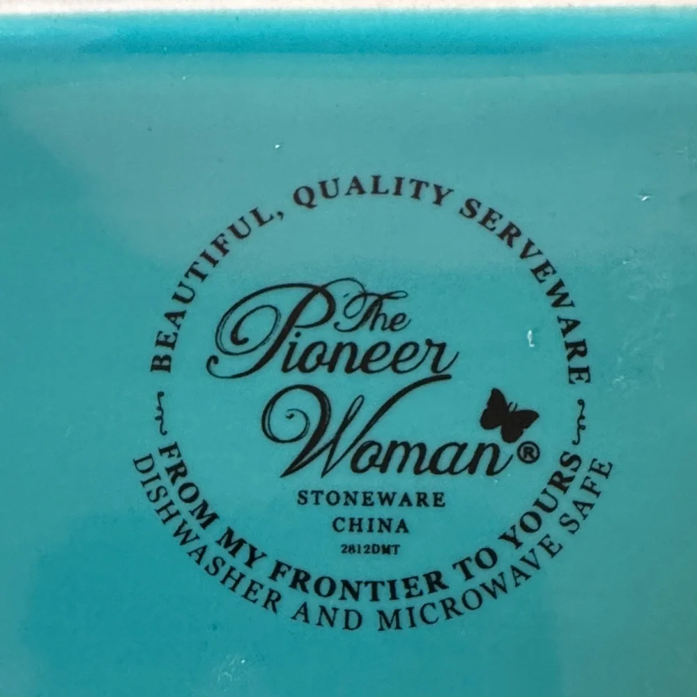 The Pioneer Woman Vintage Floral Butter Dish made of stoneware.
